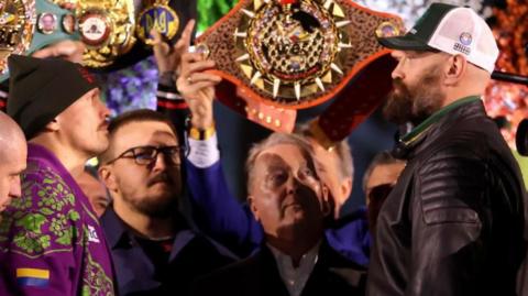 Oleksandr Usyk and Tyson Fury face off at weigh-in