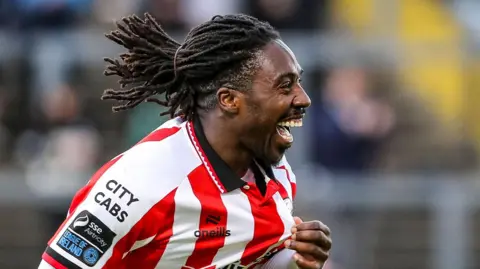Kevin Dos Santos celebrates scoring a goal for Derry City