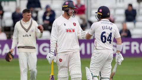 Dean Elgar and Tom Westley acknowledge their century stand at Chelmsford