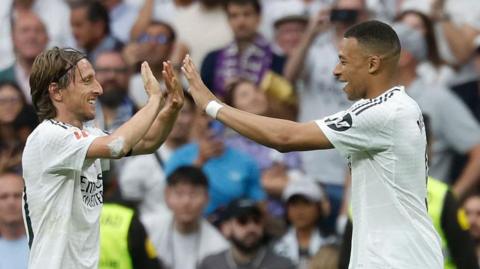 Luka Modric and Kylian Mbappe