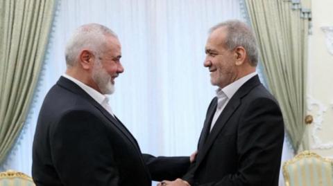 Iranian President Masoud Pezeshkian meets with Palestinian group Hamas' top leader, Ismail Haniyeh