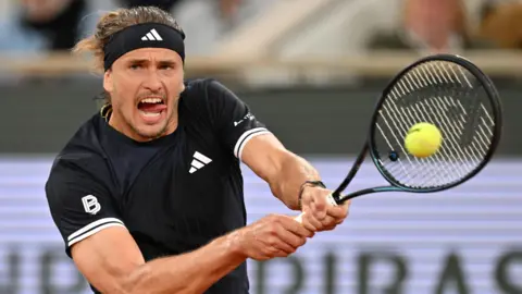 Alexander Zverev hits a backhand