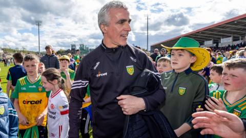 Donegal manager Jim McGuinness celebrates with Donegal fans