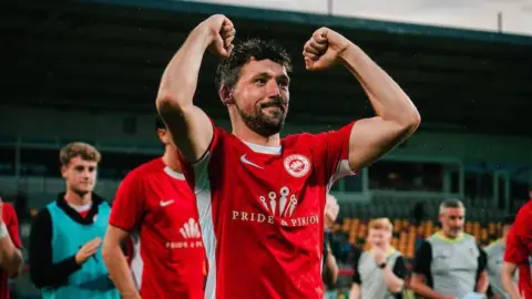 Tomas Cosgrove in action for Larne