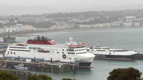 The Manxman and Manannan ferries moored in Douglas Harbour on an overcas