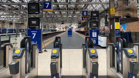Platforms 7 and 8 barriers at a deserted Glasgow Central Station