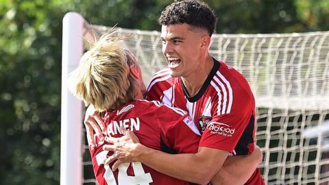 Sonny Cox celebrates scoring for Exeter City