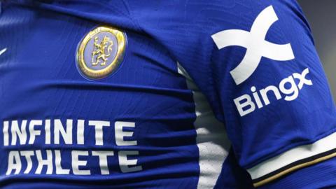 Bing X and Infinite Athlete branding on a Chelsea shirt