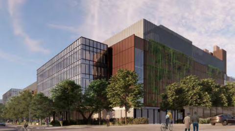 A CGI-generated picture of how the data centre could look, pending further planning applications. It is a large, tall set of buildings, with a glass frontage.