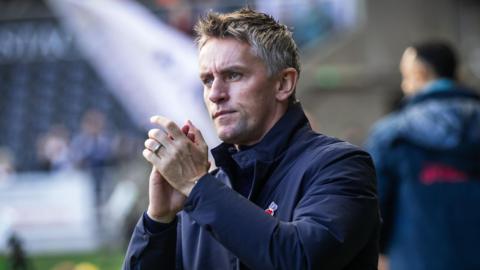 Ipswich boss Kieran McKenna applauding away fans at Swansea