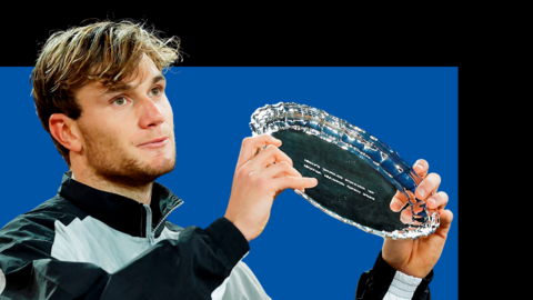 Jack Draper holds up the Madrid Open runners-up trophy