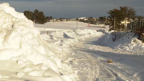 Snow piled up high in Portlethen in Aberdeenshire