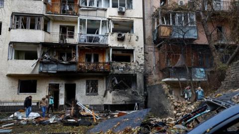 Building in Kyiv with damage after Russian attack