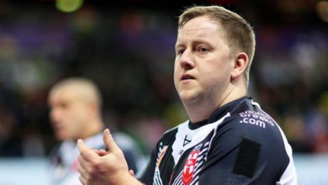 Adam Rigby applauds after England beat Ireland at the 2021 World Cup