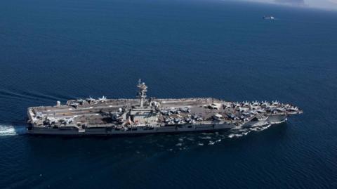 The Nimitz-class aircraft carrier USS Abraham Lincoln (CVN 72) transits the Strait of Gibraltar, entering the Mediterranean Sea as it continues operations in the 6th Fleet area of responsibility in this April 13, 2019 photo supplied by the U.S. Navy