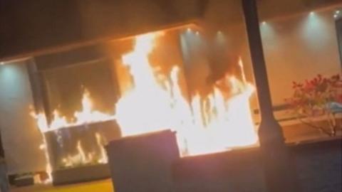 A house with flames coming out of it