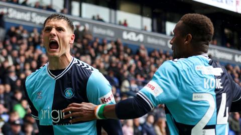 Wycombe celebrate a goal