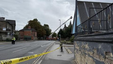 A cordon in place in Derby with an aerial ladder in the background