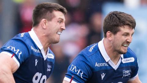 Tom (left) and Ben Curry playing together for Sale Sharks