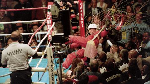 James Miller paragliding and landing ringside before Riddick Bowe vs Evander Holyfield fight at Caesars Palace, Las Vegas.