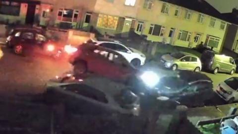 A car crashing into other cars