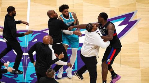 Charlotte Hornets forward Miles Bridges has an altercation with the Detroit Pistons' Jalen Duren