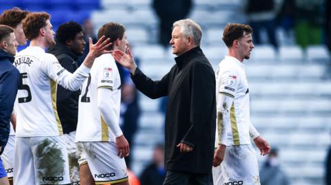 Chris Wilder shaking hands with Sheffield United players after their 1-1 draw at Birmingham City