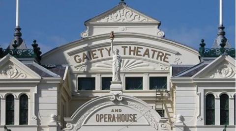 The front of the top of the Victorian-era theatre, which has Gaiety Theatre and Opera House in lettering on the front.