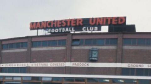 The former sign on the stadium at Old Trafford's Stretford End