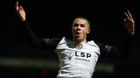 Marcus Ifill celebrates