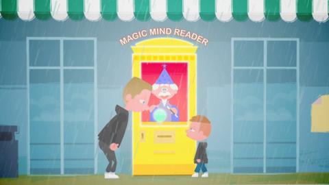 A father and child stand outside a fortune telling machine.