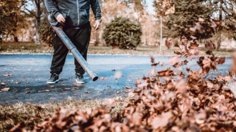 Man using a leaf blower