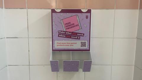 Period product dispenser in Jersey toilet