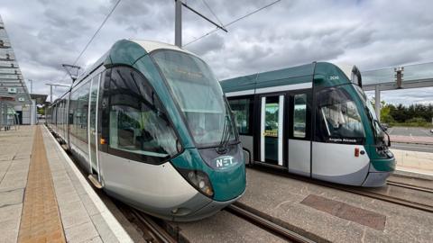 Two trams on the tracks at the Toton terminus