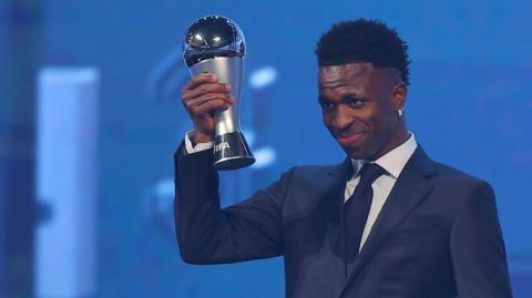 Vinicius Jr holds aloft the Fifa Best men's award in 2024