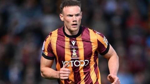Ciaran Kelly in action for Bradford City