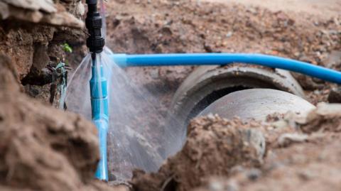 A pipe leaking in connection to another pipe
