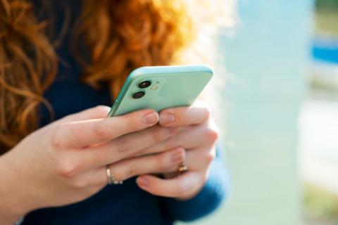 Woman holding phone