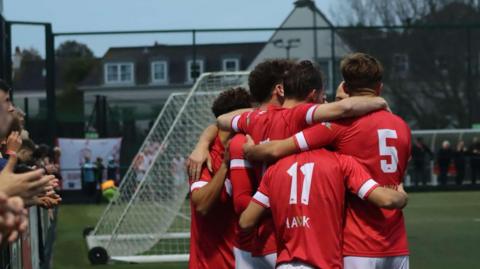 Jersey Bulls players celebrating