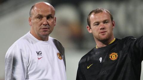 Mike Phelan and Wayne Rooney