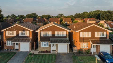 Stock photo: Houses in Surrey UK at sunrise, elevated view, morning light