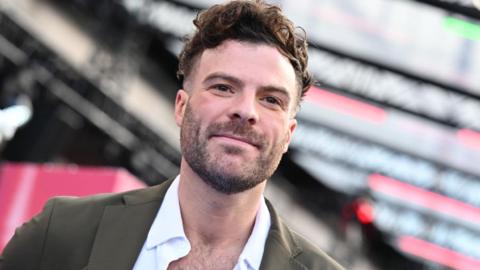 Jordan North attends the "That Christmas" headline gala during the 68th BFI London Film Festival at The Royal Festival Hall on October 19, 2024 in London, England