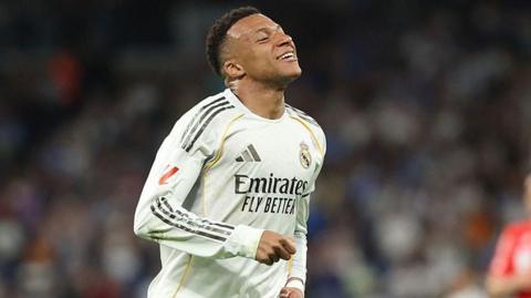 Kylian Mbappe smiling