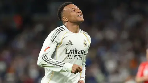 Kylian Mbappe smiling