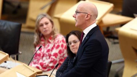 John Swinney in parliament 