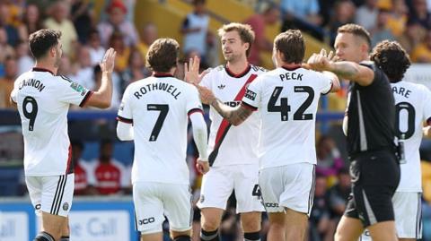 Sheffield United celebrate Patrick Bamford's goal against Mansfield Town