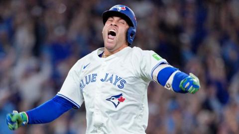 Toronto Blue Jays outfielder George Springer celebrates