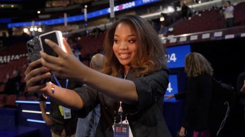 Young woman taking selfie at Democratic National Convention