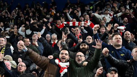 Arsenal fans celebrate victory