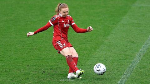 Ceri Holland scores Liverpool's second goal from the penalty spot
